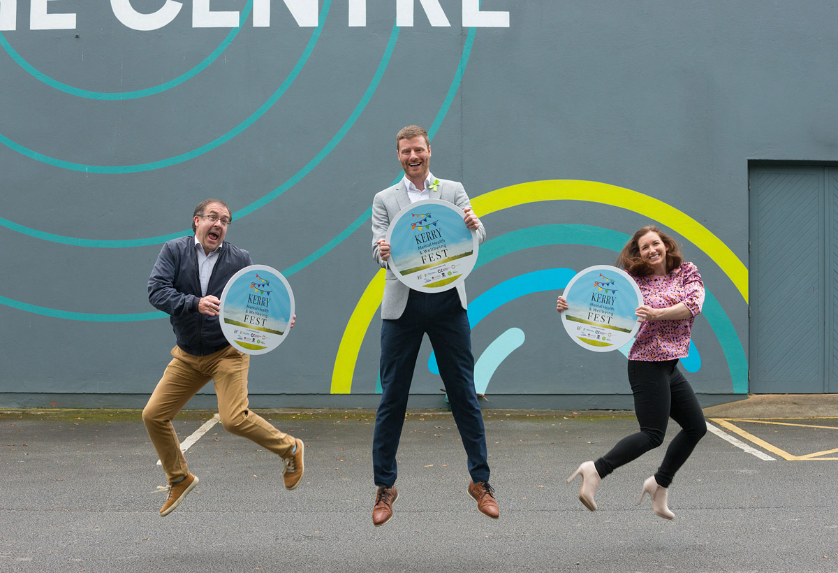 Kerry Mental Health & Wellbeing Fest 2022 organisers jumping with banners